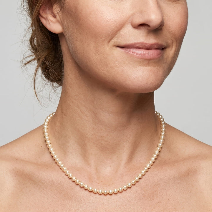 Small Pearly Necklace with Fish Charm
